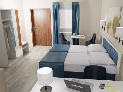 Studio mit Doppelbett und Schreibtisch